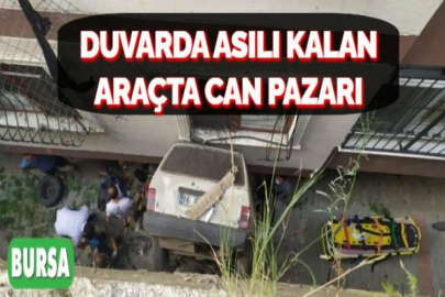 DUVARDA ASILI KALAN ARAÇTA CAN PAZARI