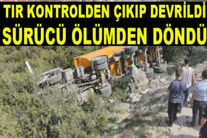 Tır kontrolden çıkıp devrildi, sürücü ölümden döndü