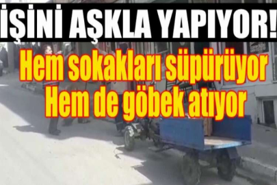 Hem sokakları süpürüyor hem de göbek atıyor