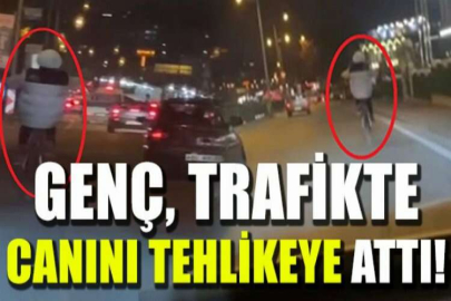 Bisikletli gencin trafikteki tehlikeli yolculuğu