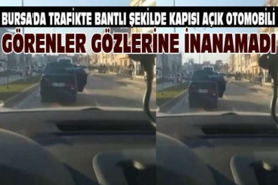 Bursa'da trafikte bantlı şekilde kapısı açık otomobili görenler gözlerine inanamadı