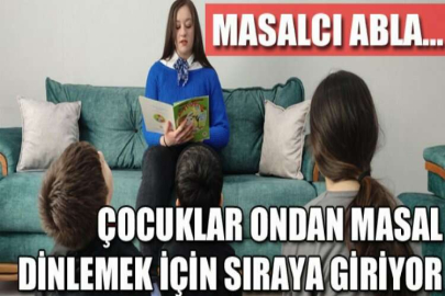 Masalcı abla...Çocuklar ondan masal dinlemek için sıraya giriyor