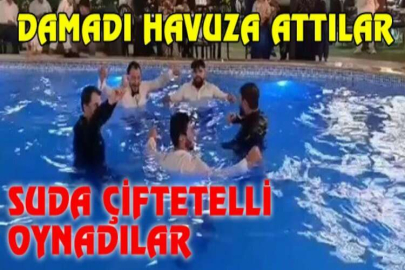 Damadı havuza attılar, suda çiftetelli oynadılar