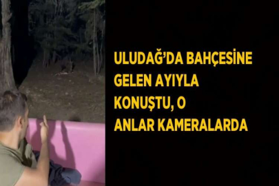 ULUDAĞ’DA BAHÇESİNE GELEN AYIYLA KONUŞTU, O ANLAR KAMERALARDA