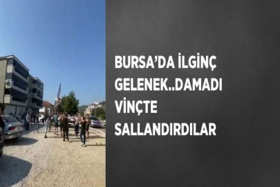 BURSA’DA İLGİNÇ GELENEK..DAMADI VİNÇTE SALLANDIRDILAR