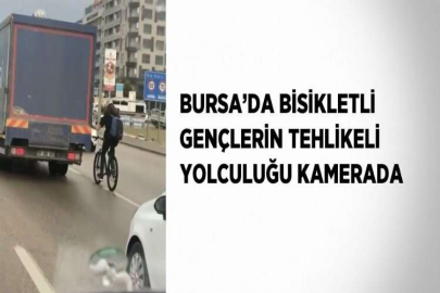 BURSA’DA BİSİKLETLİ GENÇLERİN TEHLİKELİ YOLCULUĞU KAMERADA