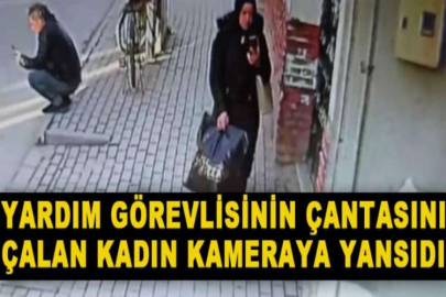 Yardım görevlisinin çantasını çalan kadın kameraya yansıdı